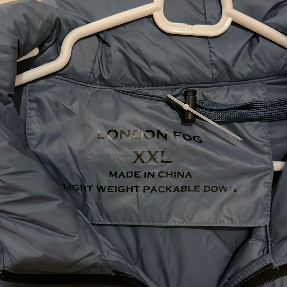 Womens packable down jacket. Lightweight but warm. Beautiful color!